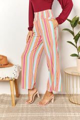 Chic Striped Smocked Waist Pants with Pockets for Versatile Wear