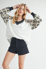 Bohemian Crochet V-Neck Top with Elegant Contrast Stitching - Aemi+Co