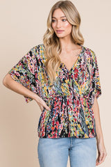 BOMBOM Women's Printed Surplice Peplum Blouse - Trendy & Versatile