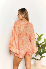 Double Take Printed Flare Sleeve Surplice Romper with Smocked Detailing