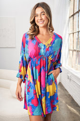 White Birch Full Size V-Neck Mini Dress with Eye-Catching Print