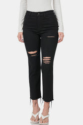 Distressed raw hem cropped jeans in black with ripped detailing, styled for a casual fashion look.