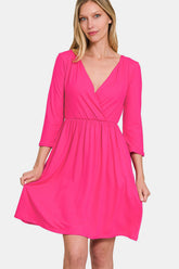 Zenana Elegant Three-Quarter Sleeve Surplice Dress with Pockets - Perfect for Any Occasion