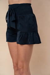 White Birch Women's High Waisted Smocked Shorts with Ruffle Hem