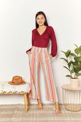 Chic Striped Smocked Waist Pants with Pockets for Versatile Wear