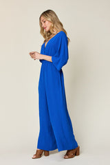 Double Take Full Size Surplice Wide Leg Jumpsuit with Pockets - Chic & Comfortable