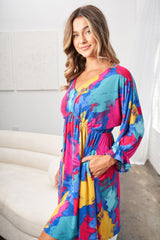 White Birch Full Size V-Neck Mini Dress with Eye-Catching Print