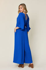 Double Take Full Size Surplice Wide Leg Jumpsuit with Pockets - Chic & Comfortable