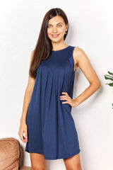 Chic Sleeveless Round Neck Mini Dress for Versatile Occasions