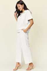 Trendy Full Size Two-Piece Texture Half Zip Short Sleeve Top & Pants Set with Pockets