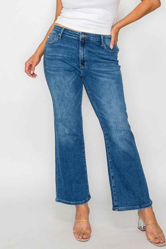 Woman wearing bytos Cat's Whiskers mid rise ankle jeans, showcasing a stylish fit and modern design.