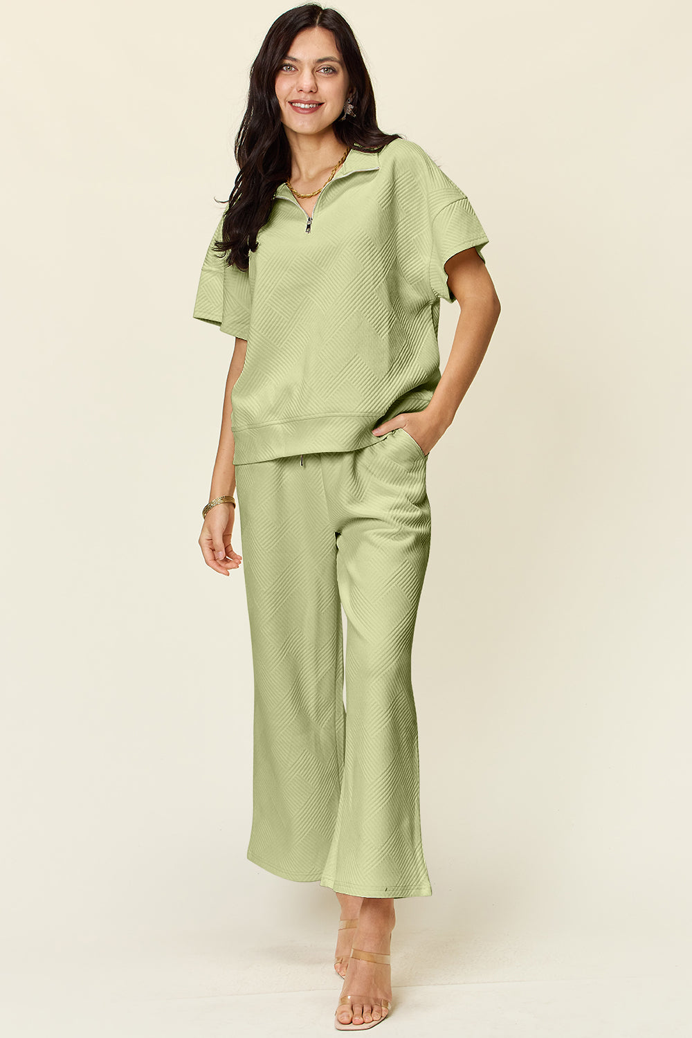 Trendy Full Size Two-Piece Texture Half Zip Short Sleeve Top & Pants Set with Pockets