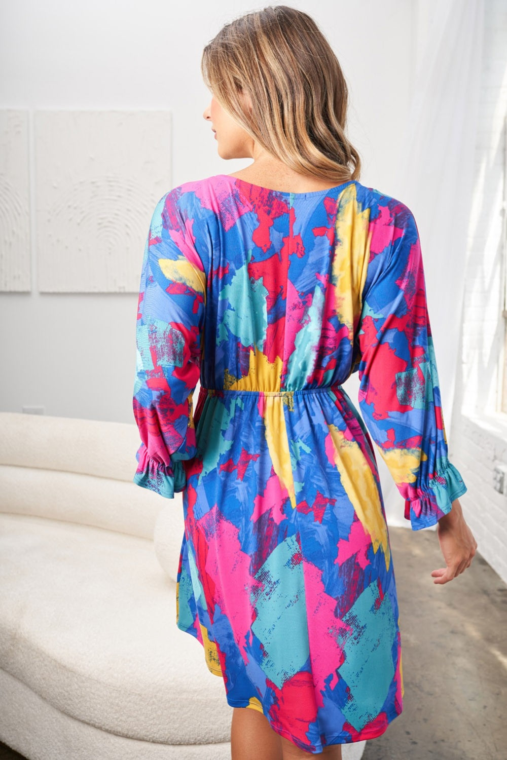 White Birch Full Size V-Neck Mini Dress with Eye-Catching Print