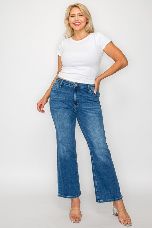 Model wearing bytos Cat's Whiskers Mid Rise Ankle Jeans paired with a white t-shirt, showcasing trendy casual style.
