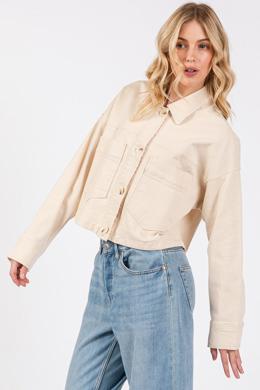 bytos Button Down Cropped Denim Jacket in cream, featuring patch pockets and a stylish, modern cropped silhouette.