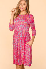 Haptics Women's Floral Round Neck Dress with Pockets - Elegant & Comfortable