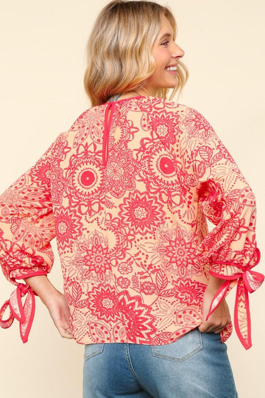 Elegant Floral Blouse with Ribbon Bow Detail and Round Neck | Haptics